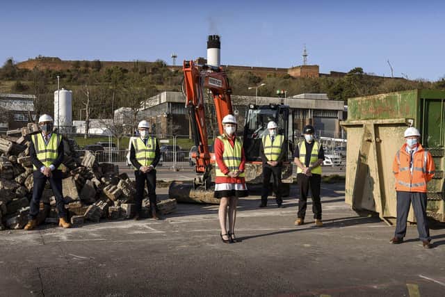 Work begins to build a new ward at QA Hospital. 

Pictured centre is chief executive Penny Emerit.