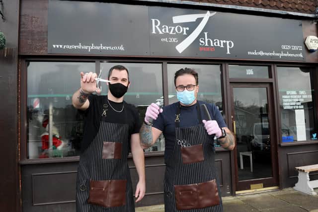Razor Sharp in Miller Drive, Fareham.
Pictured is: (l-r) Barber Jake Bascombe and owner Dom Valente.