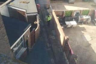 Police in an alleyway between Fisherman's Kitchen and Riva 6 beauty on Clarendon Road Southsea after an alleged rape at 10pm on August 29, 2020. Picture taken Sunday, August 30.