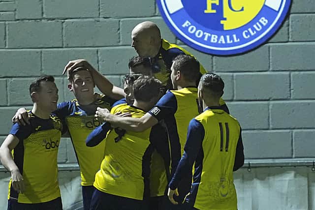Moneyfields  celebrate a goal. Picture by Barry Zee