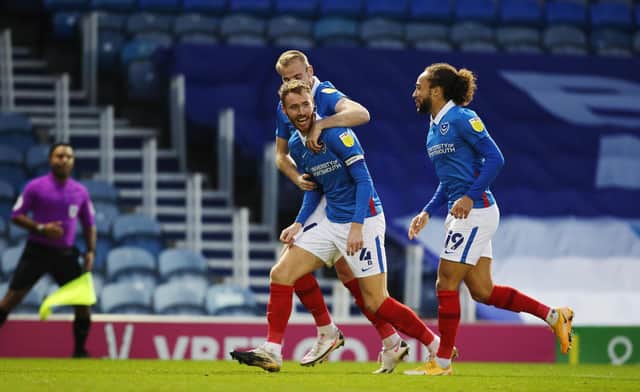 Tom Naylor celebrates netting in his third-successive Pompey game after discovering a surprise goal touch. Picture: Joe Pepler