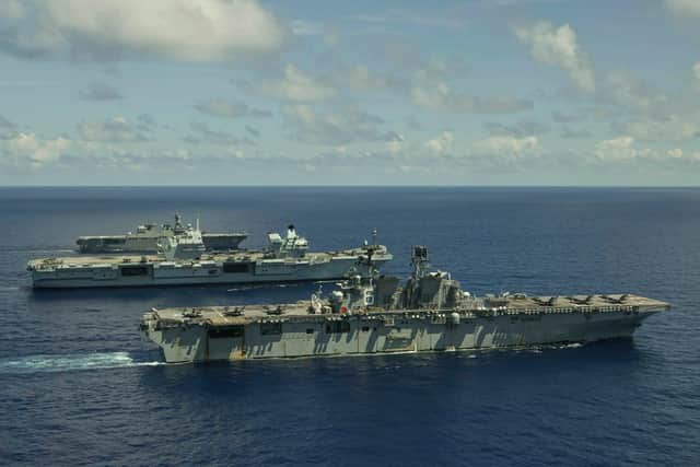 HMS Queen Elizabeth and her carrier strike group pictured on exercise with American and Japanese warships in the Pacific. Photo: Royal Navy