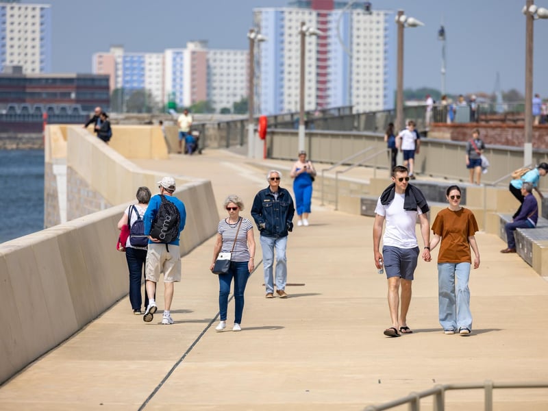 Exploring the sea defences in Old Portsmouth. Picture: Mike Cooter (110524)