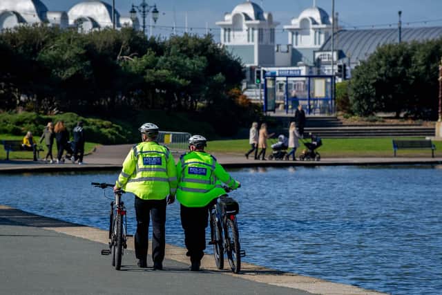 Ease of lockdown restrictions are lifted as people up to a group of six can meet outdoors on 29 March 2021.
Pictured: Police presence at Canoe Lake Southsea.
Picture: Habibur Rahman