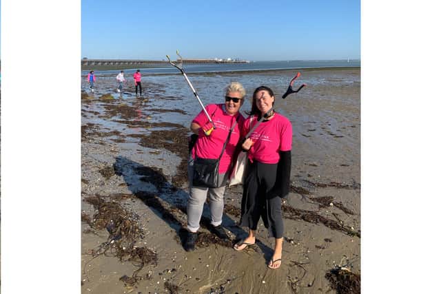 A Hampshire based company has given its staff an extra paid day off to support charitable causes. Pictured: MindWorks Managing Director, Michelle Leggatt, and Beth Cave, Account Executive and Environment Officer for the agency, join in a beach clean as part of a joint charity initiative with Wightlink.