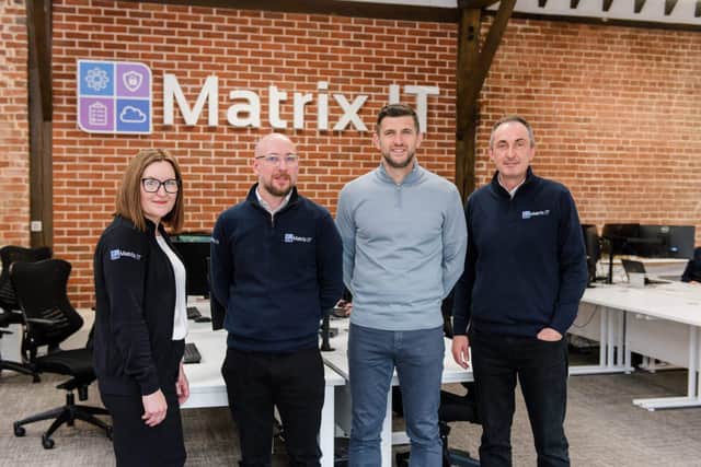 John Mousinho with the Matrix IT team