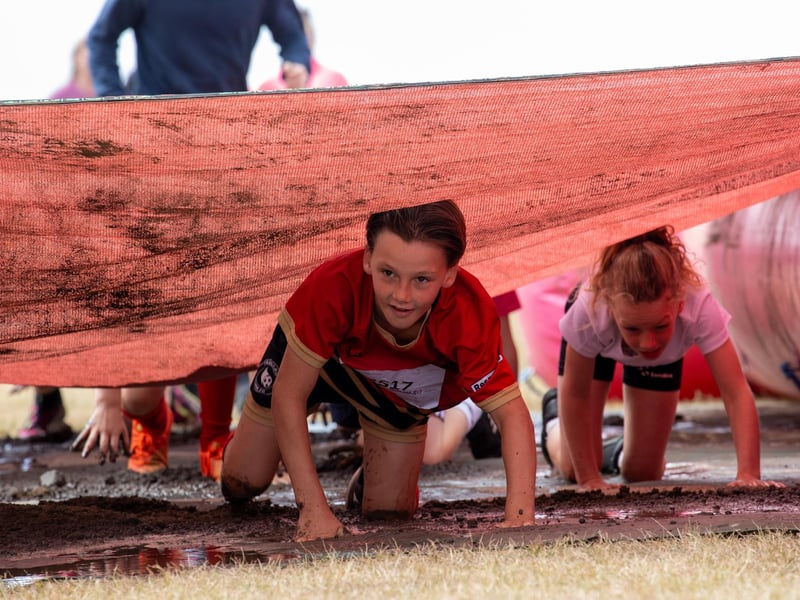 Race for Life Pretty Muddy took place on Saturday morning on Southsea Common as children and adults took on the obstacle course race.
Photos by Alex Shute