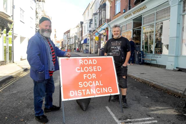 A section of Castle Road in Southsea, has been pedestrianised to allow for social distancing. Many traders are happy with the atmosphere this has created and believe it is a safer, better shopping experience for customers as a result.
Pictured is: (l-r) Pete Codling and Tony Wood.
Picture: Sarah Standing (011020-4751)