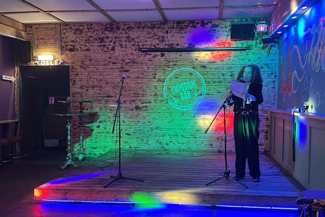 Cecily Holland, of Southsea, performing with The Pompey Poets at Emporium Bar on Thursday (October 5). Picture: Lucy Hunt.
