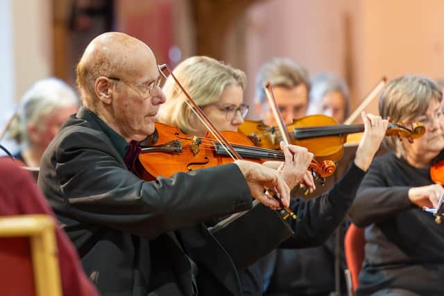 Orchestra leader Colin Wilkins playing in the December concert of the Portsmouth Philharmonic which raised £380 for Portsmouth ReadEasy.