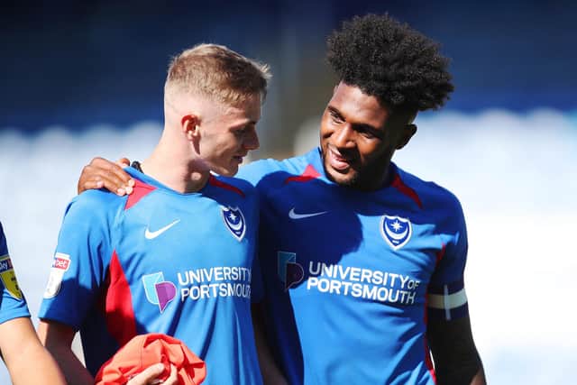 Eoin Teggart with first-teamer Ellis Harrison after last season's win against Norwich under-21s