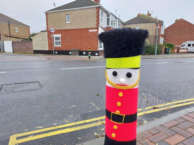 A woollen soldier stands guard by Baffins Pond