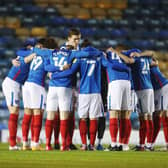 Pompey have team spirit, talent - and 23 matches to win promotion. Picture: Joe Pepler