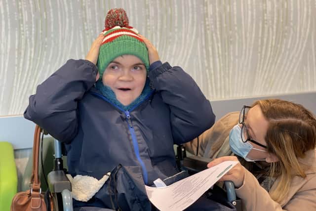 12-year-old Jamie Ancill, who is terminally ill, wasnominated for a national award by Whiteley opticians. As a result, he received his dream Christmas gift - a trip to Legoland and a large box of Lego.
Pictured is Jamie with his mum Emily