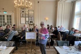Thelma Turner-Hill and Compass Carers enjoying afternoon tea