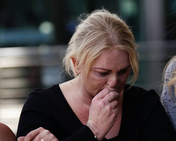 Hollie Dance surrounded by family and friends, outside the Royal London hospital in Whitechapel, east London, after the death of her 12-year-old son Archie Battersbee Picture: Aaron Chown/PA Wire