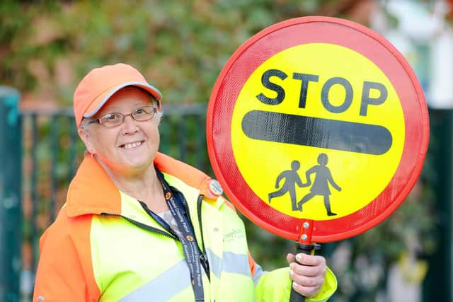 School patrol crossing officer Bridget Bathe (61) from Gosport, celebrated her 25th anniversary in the role on Thursday, October 15.

Picture: Sarah Standing (151020-7919)