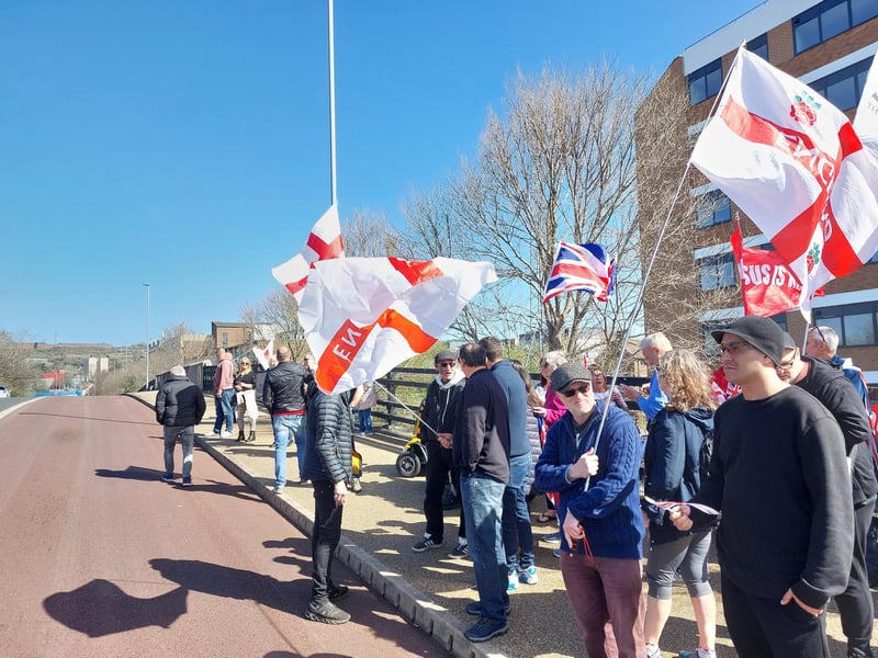 Illegal immigration protestors gathered outside Roebuck House in Cosham on Sunday, March 30.