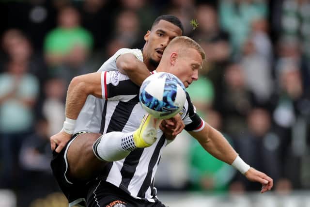 Curtis Main, pictured battling against Moritz Jenz, was singled out for praise from his St Mirren boss after helping end Celtic's 364-day unbeaten league run. Picture: Steve Welsh/PA Wire