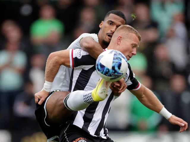 Curtis Main, pictured battling against Moritz Jenz, was singled out for praise from his St Mirren boss after helping end Celtic's 364-day unbeaten league run. Picture: Steve Welsh/PA Wire