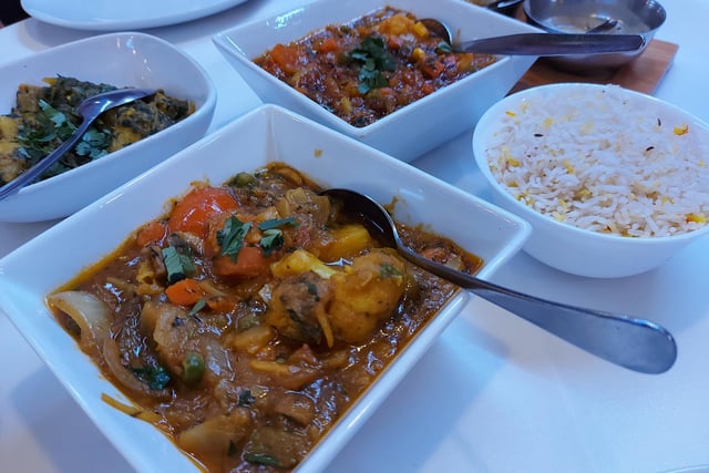 Purple Mango, 27 Albert Road, Southsea, is ranked 10th on TripAdvisor after being given a 4.5 star rating from 157 reviews. Pictured is the vegetable pathia next to vegetable dupiaza, sag aloo and rice.