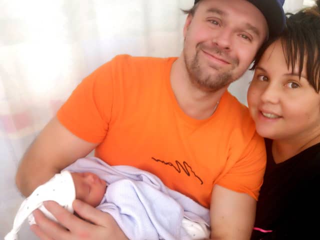 Columnist Cheryl and husband Matt with baby girl, Harley