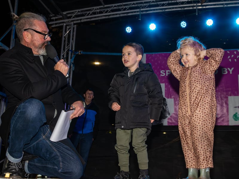 Hundreds of residents descended on Commercial Road to watch local dance troops and celebrities come together to turn on the Christmas lights.
Pictured - Kids answered questions to win tikets to the theatre
Photos by Alex Shute