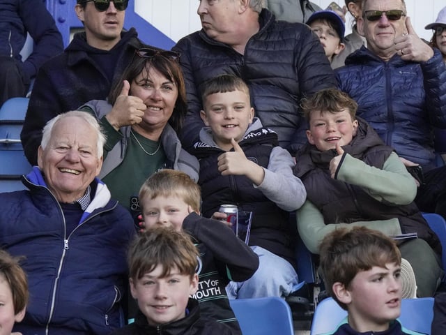 Pompey fans played a big role in carrying their team to a massive three points in their Championship survival battle against Blackburn Rovers.