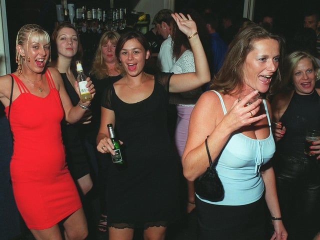 Revellers dancing the night away at Buddies 25+ nightclub at The Pyramids Centre, Southsea.