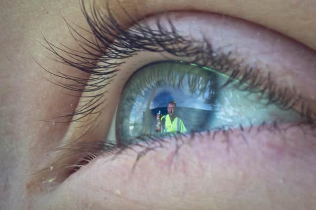 Artist My Dog Sighs has finished painting his mural at Hilsea Lido on July 23, 2020.
Pictured: Artist MyDogSighs through the eye of Katie Nicholls, nine, near the mural.
Picture: Habibur Rahman