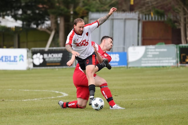 Action from the Oscar Owers Cup final between AFC Stubbington (all red kit) and Rowner Rovers. Picture: Kevin Shipp