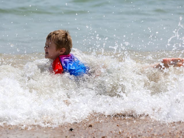 Ronnie Hallibone, age five, goes for a swim.