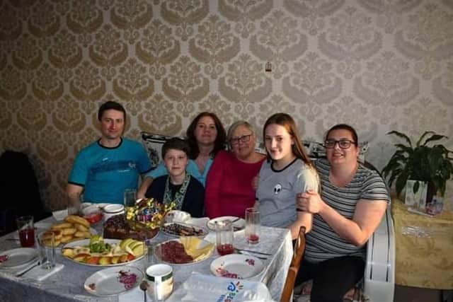 From left to right -  Sergei Berdnikov, Illia Berdnikov (now 17), Iryna Berdnikov, Lindsay Cullimore, Emma Mack (now 18) and Jo Cullimore. Picture: Jo Cullimore/PA Wire.