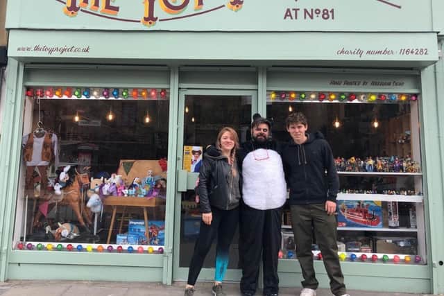 Staff outside The Toy Project in London.