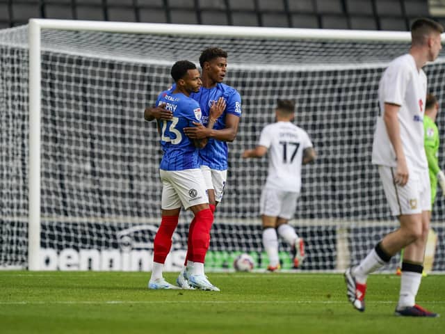 Pompey scorer Josh Murphy celebrates with Kusini Yengi after his third-minute strike. Picture: Jason Brown/ProSportsImages