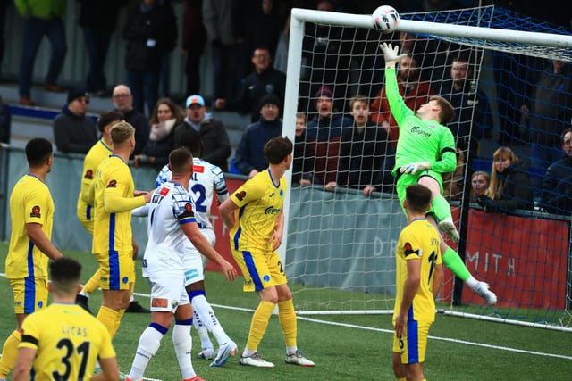 Sam Matthews (out of shot) scores Hawks' late winner. Picture by Dave Haines