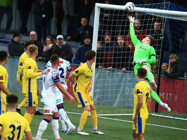 Sam Matthews (out of shot) scores Hawks' late winner. Picture by Dave Haines
