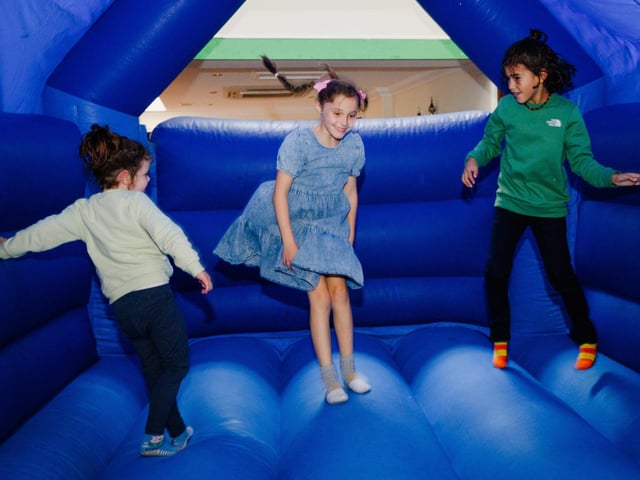 Pictured is: Children enjoying themselves on the bouncy castle
Picture: Keith Woodland (290921-18)
