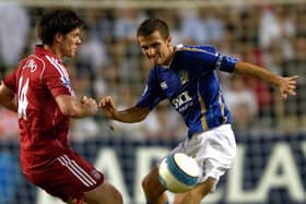 Gary O'Neil battles with Liverpool's Xavi Alonso during a Barclays Asia Trophy final encounter in July 2007. PIcture: Will Caddy