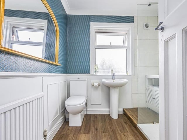 The home has a garage and a driveway which makes it a desirable property in the city.