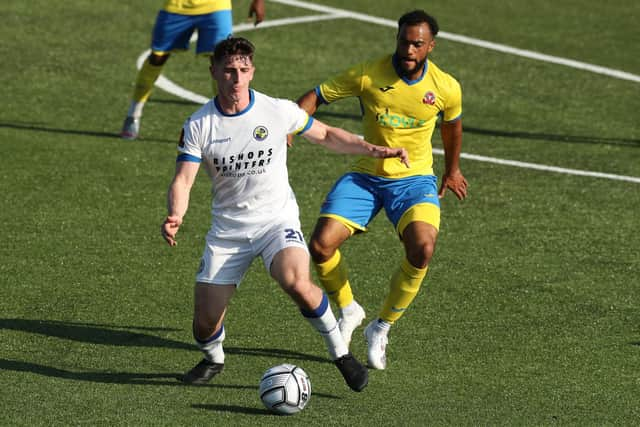 James Roberts in FA Cup action for Hawks against Beaconsfield  in the second qualifying round. Picture: Dave Haines.