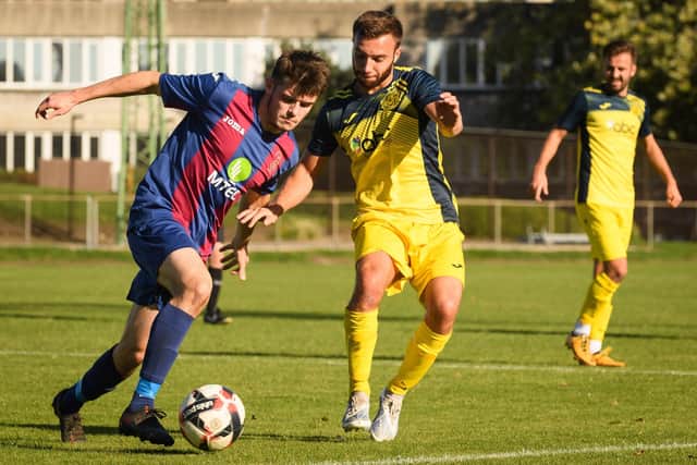Luke Richards, left, in action for US Portsmouth during October's home derby loss to Moneyfields. The return fixture is at Westleigh Park on Tuesday (8pm).
Picture: Keith Woodland