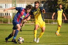 Luke Richards, left, in action for US Portsmouth during October's home derby loss to Moneyfields. The return fixture is at Westleigh Park on Tuesday (8pm).
Picture: Keith Woodland