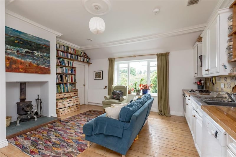 Open plan sitting room and kitchen.