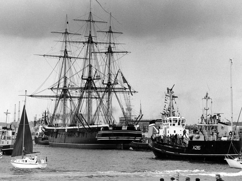 Mid-19th Century masts dominate the 20th Century harbour scene as the long voyage draws to a close in June 1987. The News PP5412