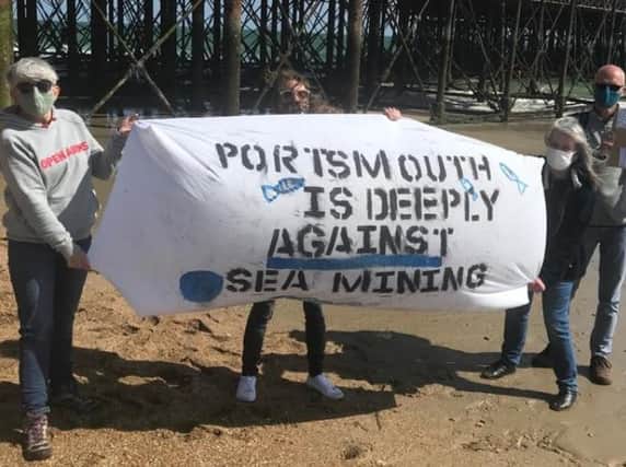 Portsmouth Greenpeace photographed their banner against ocean mining as part of a nationwide day of action. Picture: Portsmouth Greenpeace
