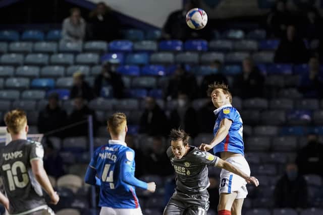 Sean Raggett blunts another Fleetwood attack as Pompey register a four-successive clean sheet. Picture: Jason Brown/ProSportsImages
