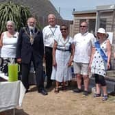 Portsmouth Cats Lost Found Rehomed launched their cat cabins. 
Pictured: Group photo with the charity volunteers and Mayor Hugh Mason with Mayoress Marie Costa at the launch of Penn'y Place in 2022