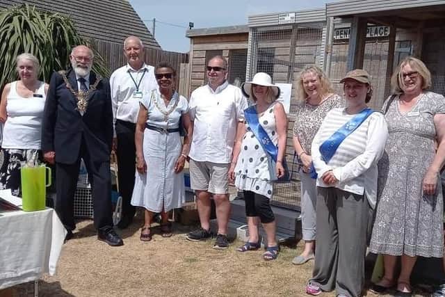 Portsmouth Cats Lost Found Rehomed launched their cat cabins.
Pictured: Group photo with the charity volunteers and Mayor Hugh Mason with Mayoress Marie Costa at the launch of Penn'y Place in 2022