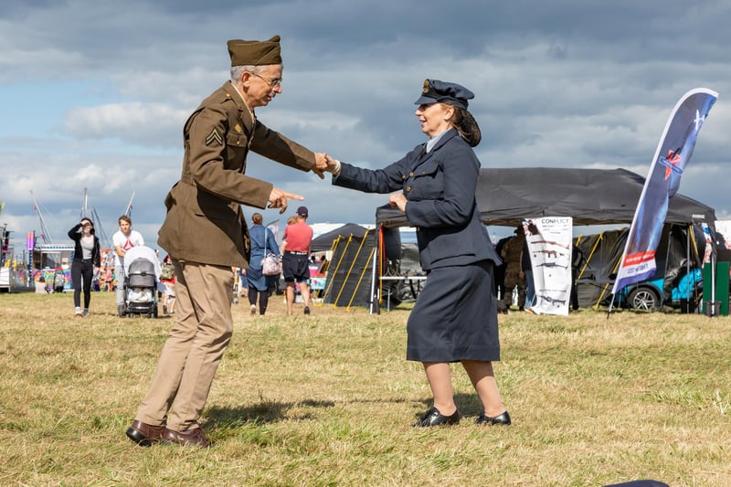 Impromptu jive dancing to a 40s soundtrack. Pictured: Jacquie Broom (56) and Robert Tipping (53).